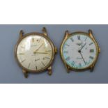 A Longines 9ct. Gold Cased Wrist Watch together with another 9ct. gold wrist watch by Envoy