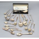 A London Silver Millennium Spoon made by Haviland within original box, silver and white metal spoons