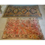 A North West Persian Woollen Rug with three medallions within an all over design upon a blue,