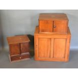 A Mahogany Table Cabinet with two doors above a drawer together with another similar mahogany