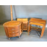 A Continental Carved Hardwood Oval Chest of Three Drawers together with a similar nest of tables,