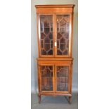 An Edwardian Mahogany Satinwood Inlaid Standing Corner Cabinet with four astragal glazed doors