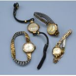 A Majex 9ct. Gold Cased Ladies' Wrist Watch together with three other 9ct. gold cased ladies wrist