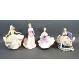 A Royal Doulton Figurine 'Julie' HN3878 together with two other Royal Doulton figurines 'Sweet