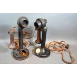 An Early Bakelite and Metal Standing Telephone together with another similar