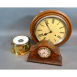 A Brass Bulkhead Barometer Thermometer by Schatz together with a circular wall clock and an