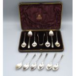 A Victorian Silver Cased Set of Six Coffee Spoons with scallop shaped bowls and matching sugar