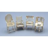 Four Birmingham Silver Miniature Model Chairs ranging from 4 to 6 cms tall, maker's mark L&S
