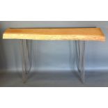 An Oak Plank Top Side Table with metal legs, 126 x 32 cms, 76 cms high