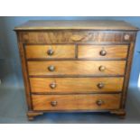 A 19th Century Mahogany Straight Front Chest, the hinged top above a shell inlaid frieze with two