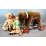 An Early Merrythorpe Push Along Toy in the form of a Bear together with an early Merrythorpe teddy