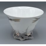 A Royal Copenhagen Bowl decorated with dragonfly, 13 cms diameter