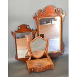 A Mahogany Chippendale Style Wall Mirror, 88 x 50 cms together with another similar smaller, 62 x 36
