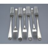 A Set of Seven George III Irish Silver Table Forks with engraved decoration, Dublin 1876, maker's