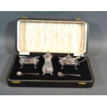 A Birmingham Silver Three Piece Condiment Set within fitted case