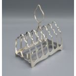 A George V Silver Six Bar Toast Rack with carrying handle, Sheffield 1919, maker's James Dixon &