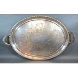 A Large Oval Silver Plated Two Handled Tray with engraved decoration, 47 x 72 cms