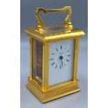 A 20th Century Heavy Brass Carriage Clock, the enamel dial with Roman numerals and inscribed Angelus