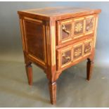 A French inlaid bedside chest, the inlaid top above two oval inlaid drawers with brass handles,