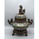 A Chinese patinated bronze and Champleve sensor, 36cms tall