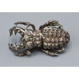 A Victorian white metal brooch in the form of a Scarab beetle, 4cms long