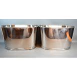 A pair of large Champagne coolers bearing script relating to Bollinger, 43cms long