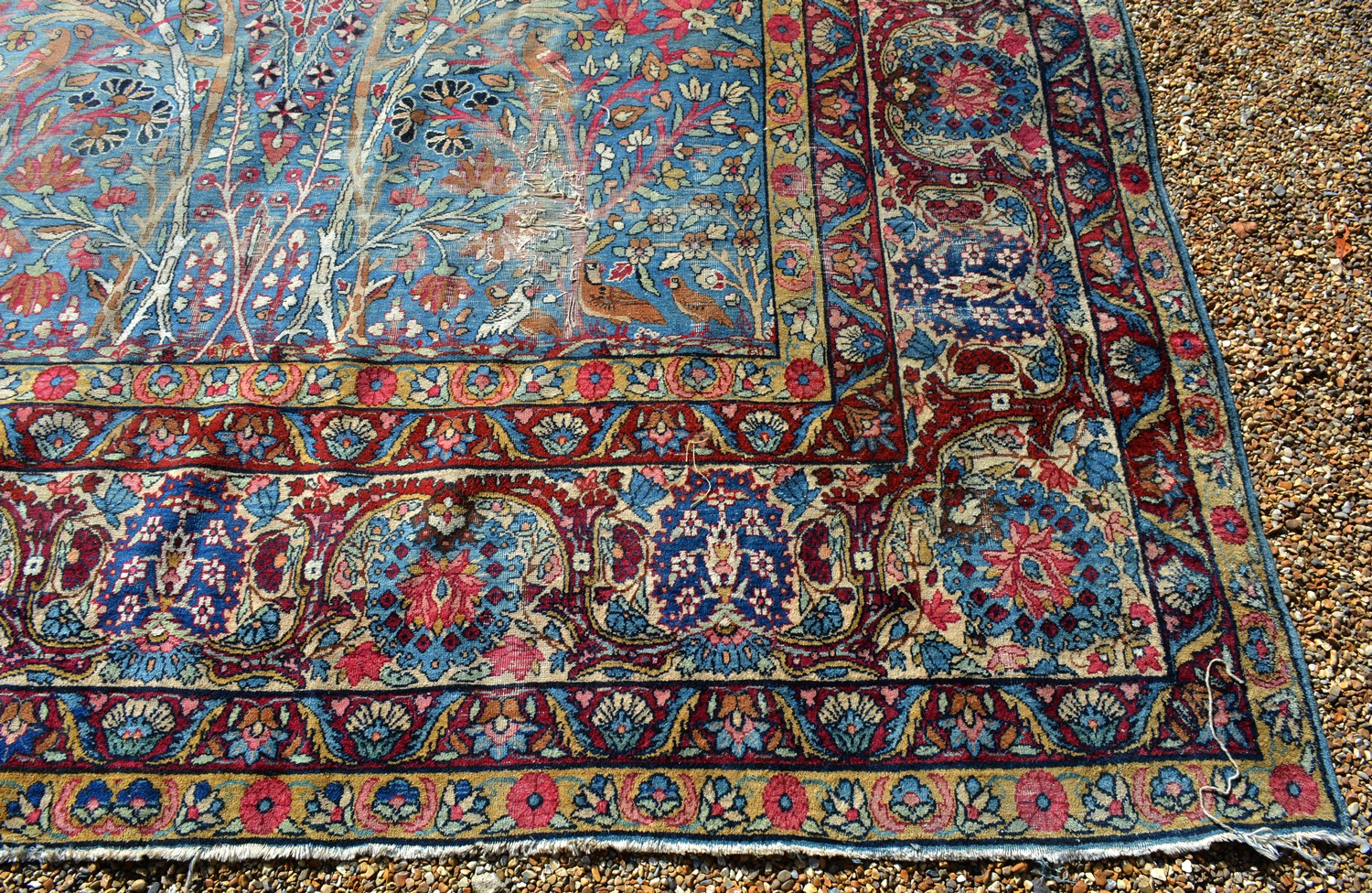 A Tabriz Carpet, with an allover design upon a blue ,red and cream ground within multiple borders, - Image 3 of 7