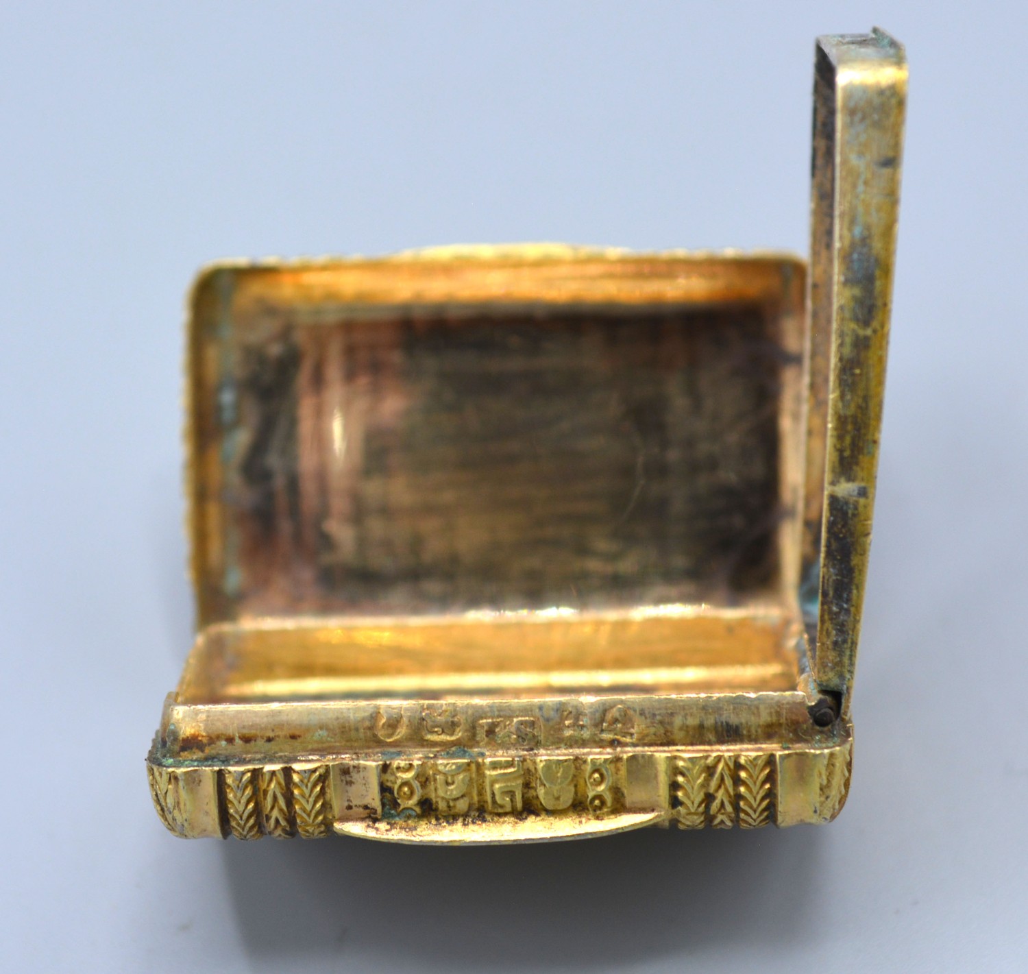 A Georgian silver gilt vinaigrette, the engraved hinged cover enclosing a pierced grill, - Image 3 of 3