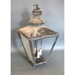 A Patinated Metal Hall Lantern of tapering form bearing label W. Edgar & Son Ltd. 80 cms tall
