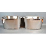 A pair of Champagne coolers bearing script relating to Bollinger, 34.5cms long