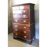 A George III mahogany chest on chest, the moulded cornice above two short and six long drawers