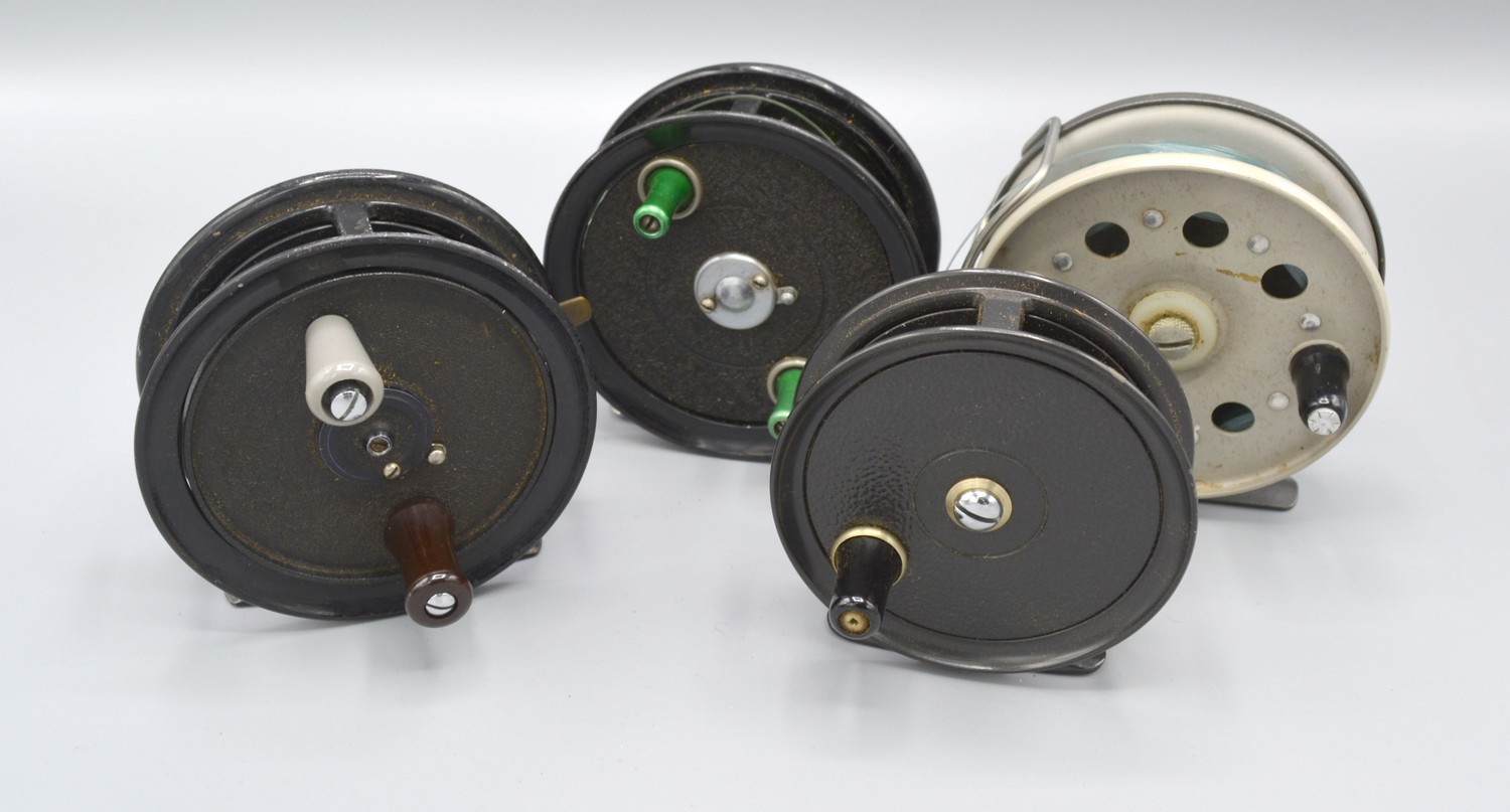 The Competitor fishing reel, together with another similar, 9cms diameter, another fishing reel