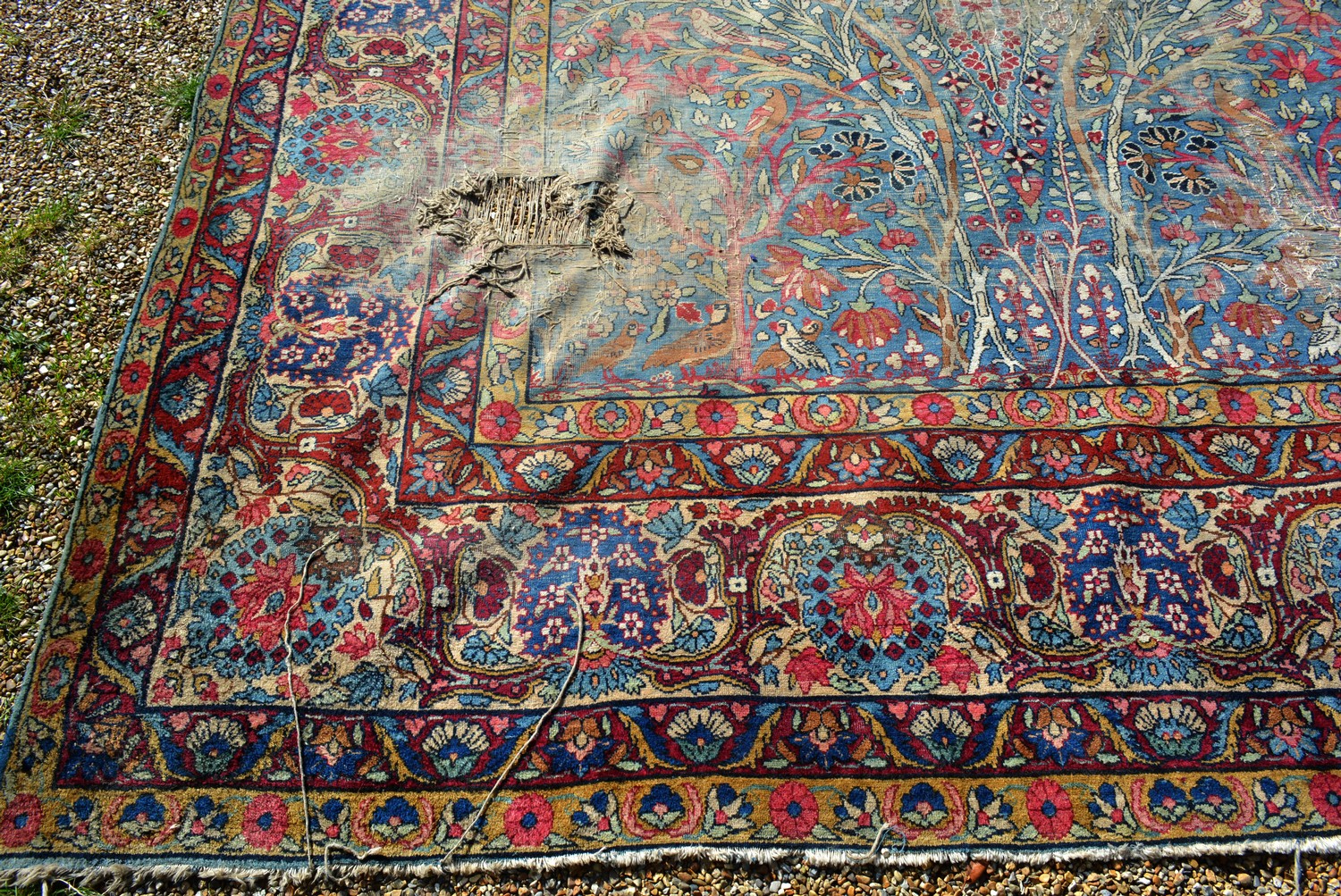 A Tabriz Carpet, with an allover design upon a blue ,red and cream ground within multiple borders, - Image 2 of 7