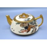 A 19th Century Japanese Satsuma Teapot with hand painted and gilded decoration depicting a bird of