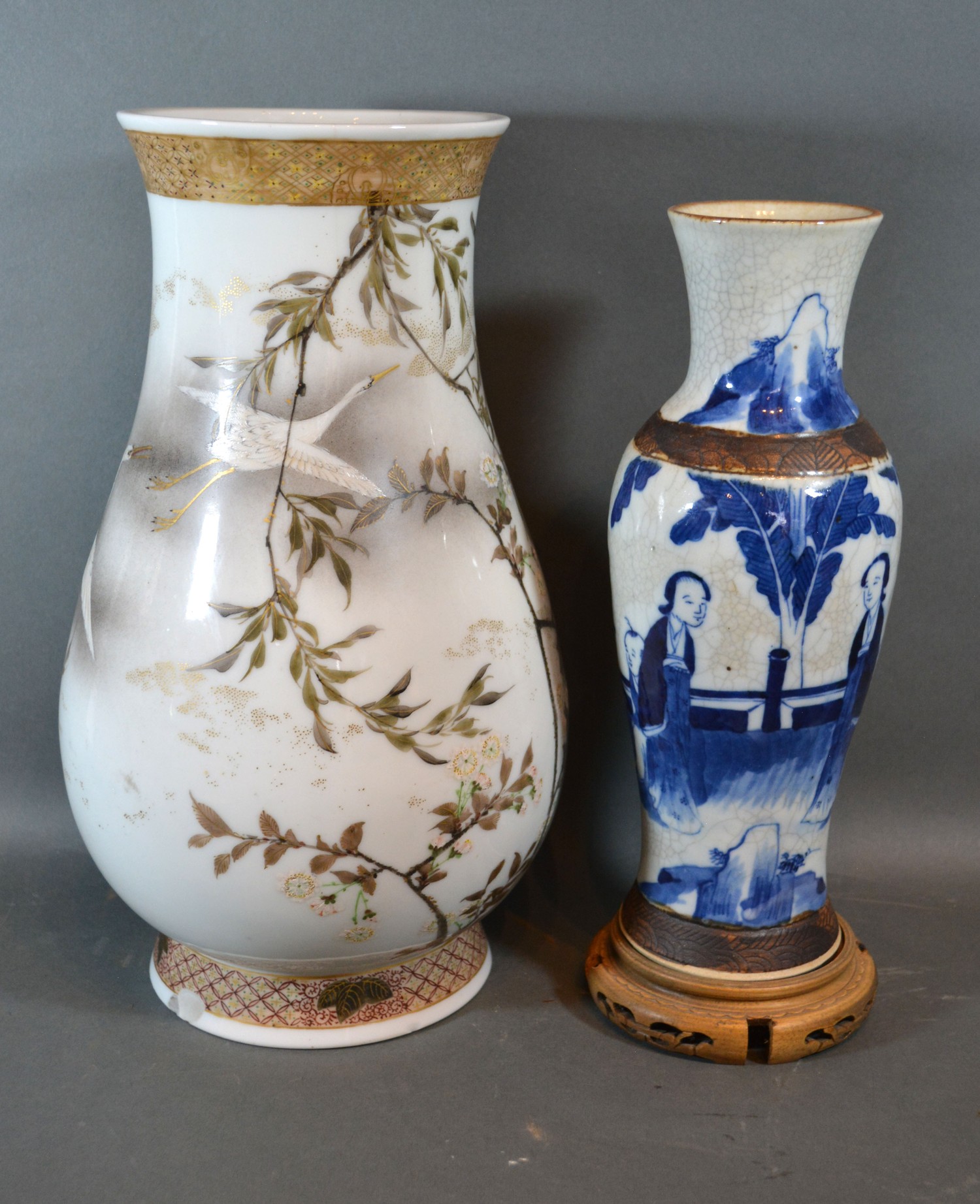 A Japanese porcelain vase decorated birds amongst foliage, 36cms tall together with a crackleware