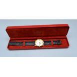 An 9ct gold Omega Seamaster automatic gentlemans wristwatch, 3.5cms diameter dial, with Omega box