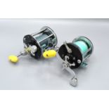 A Penn leveline 350 fishing reel together with another Penn No. 200