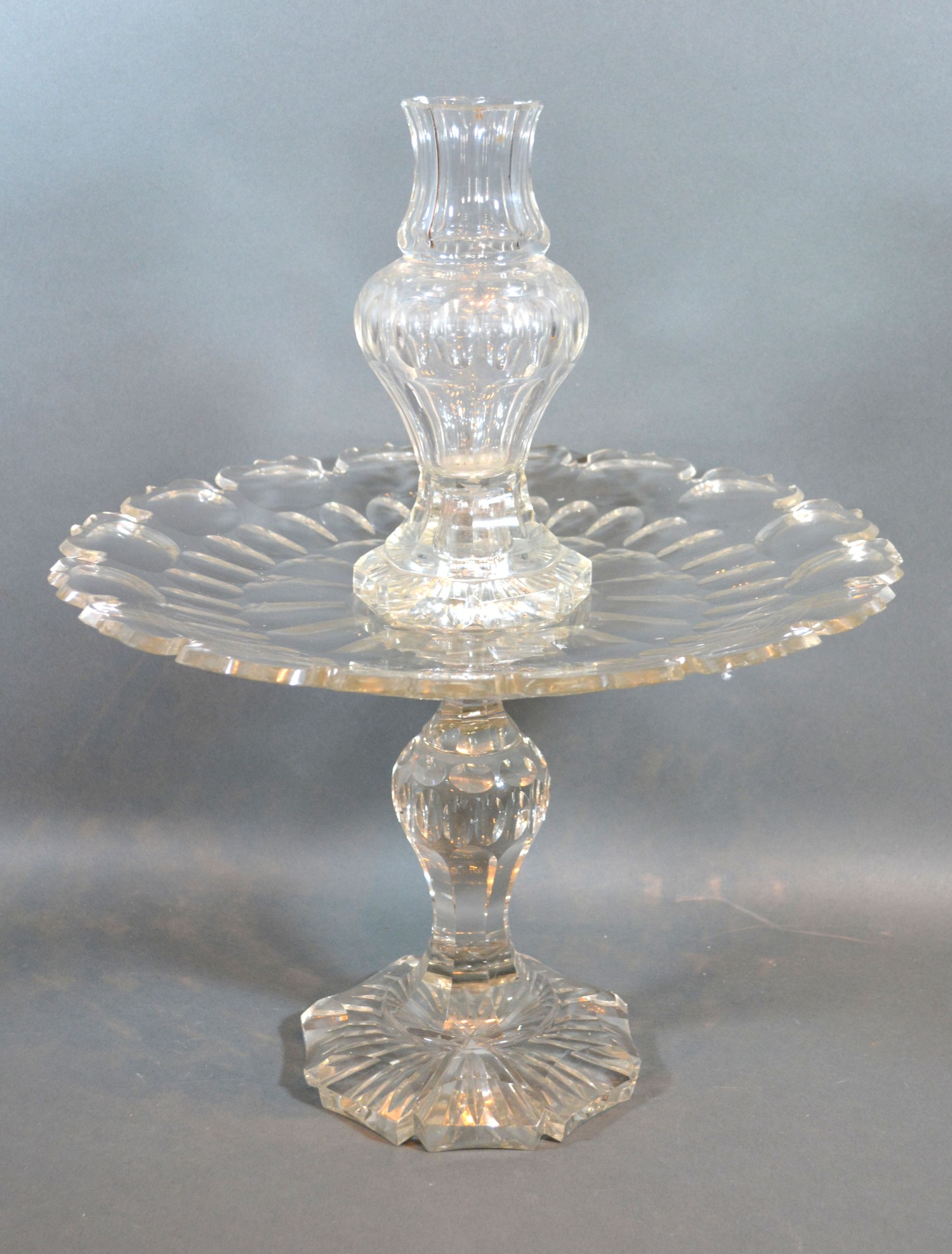 A Victorian Cut-Glass table centre with circular shaped dish upon a shaped stand 45cm tall