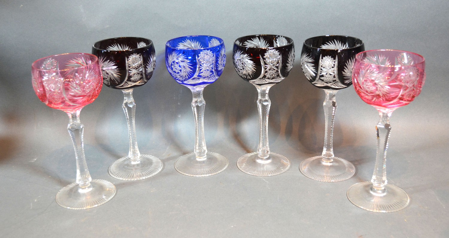 A Set of Six Cut Glass Hock Glasses with star cut decoration, 19 cms tall