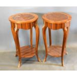 A Pair of French style occasional tables each with an inlaid circular top above a shaped frieze