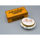A Box Decorated with Musical Instruments together with a German Porcelain box and cover hand-painted