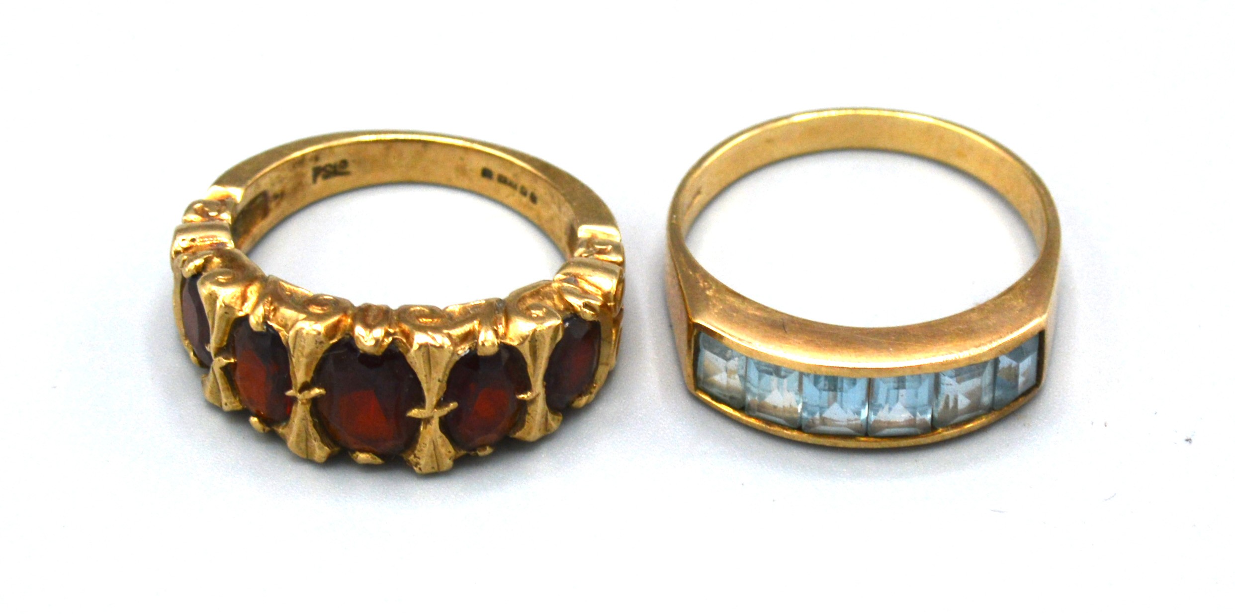 A 9ct. Gold Dress Ring set five graduated garnets, ring size L, 4.9 gms. together with another