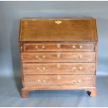 A 19th century mahogany satinwood inlaid bureau, the fall front above four long drawers raised