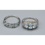 A 9ct. White Gold Aquamarine and Diamond Set Dress Ring, ring size O, 2.9 gms. together with another