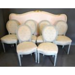 A Set of Six French Painted Dining Chairs each with an oval partly upholstered back above a stuff