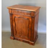 A William IV Rosewood side cabinet, the moulded top above a frieze drawer above a door flanked by