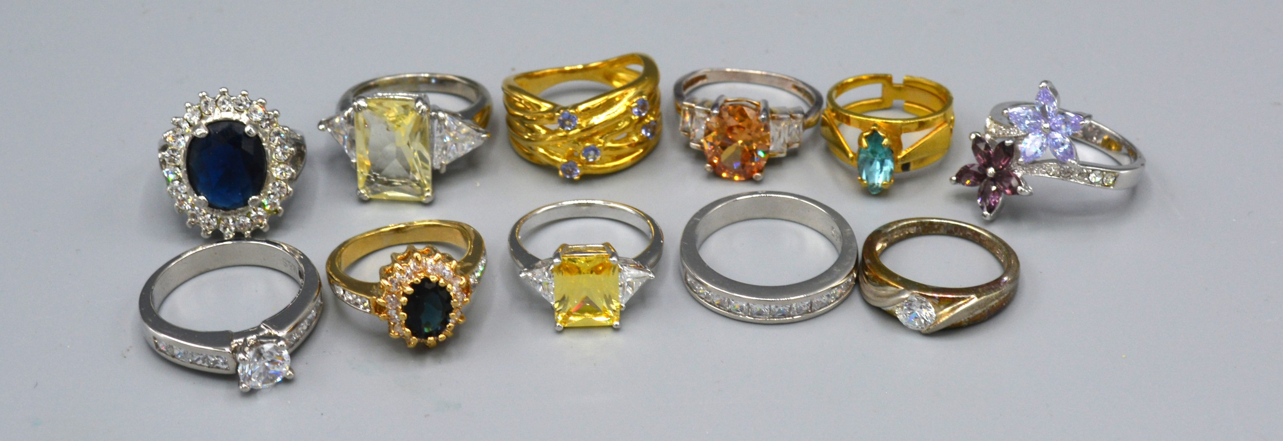 A 925 Silver Dress Ring together with ten other similar dress rings