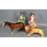 A Beswick Model in the form of a Lion together with a similar Beswick model of a horse and two
