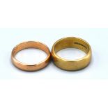 A 9ct. Gold Wedding Band together with another similar 9ct. gold wedding band, 7.2 gms.