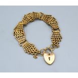 A 9ct. Gold Gate Link Bracelet with Padlock Clasp 25.1 gms.